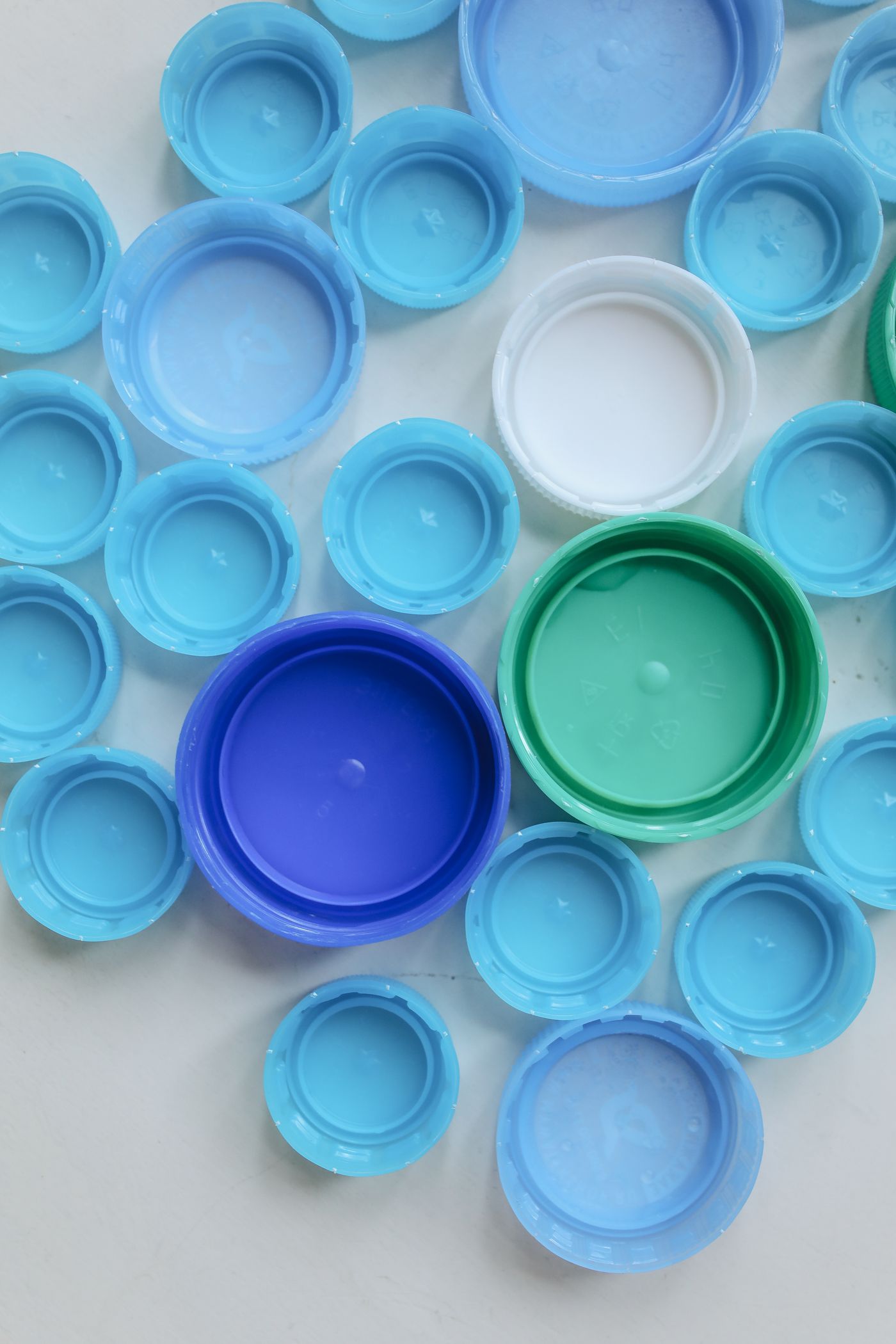 Assorted molded plastic bottle caps and closures